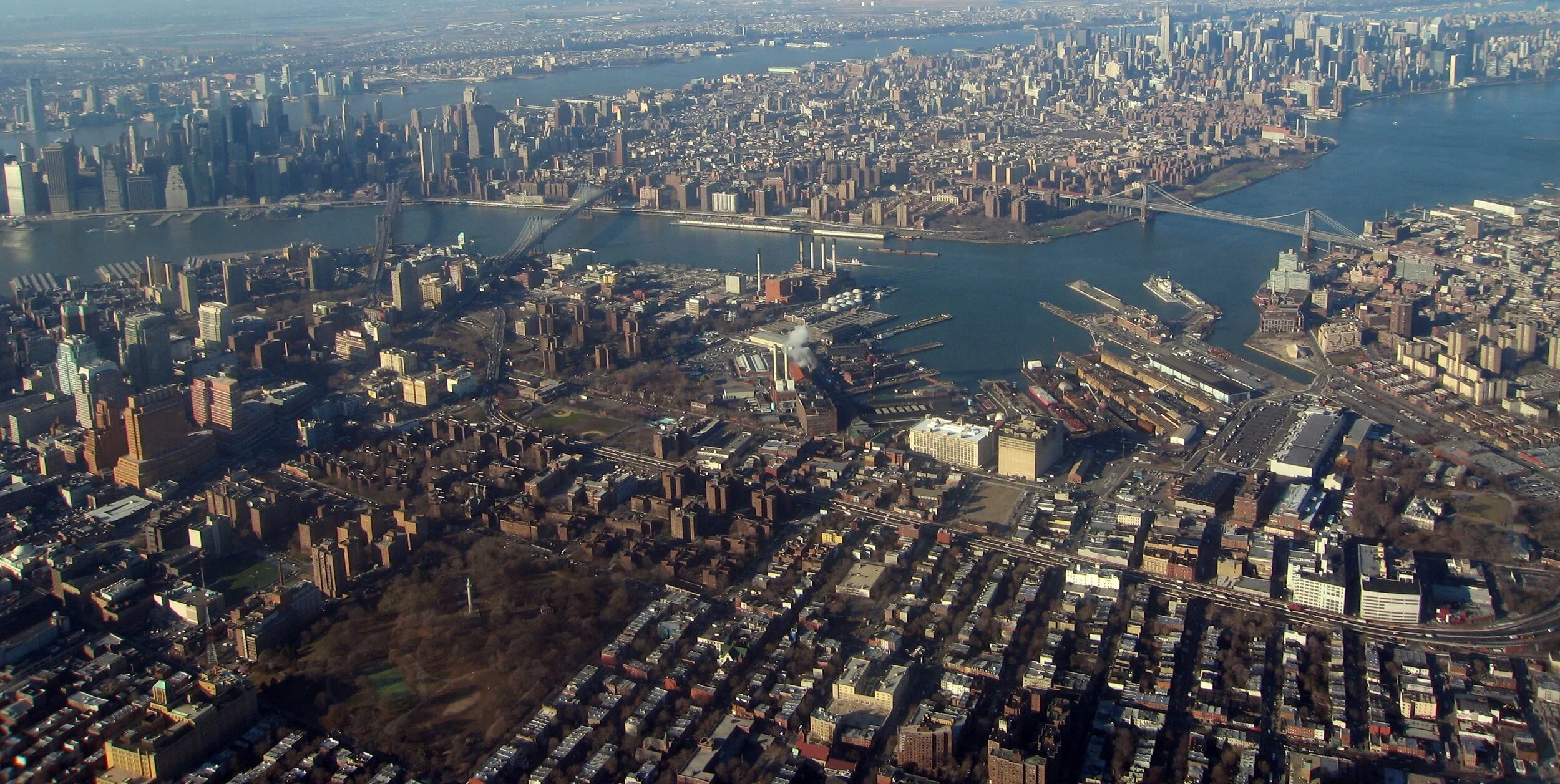 Aerial view of New York City borough neighborhoods and bridges