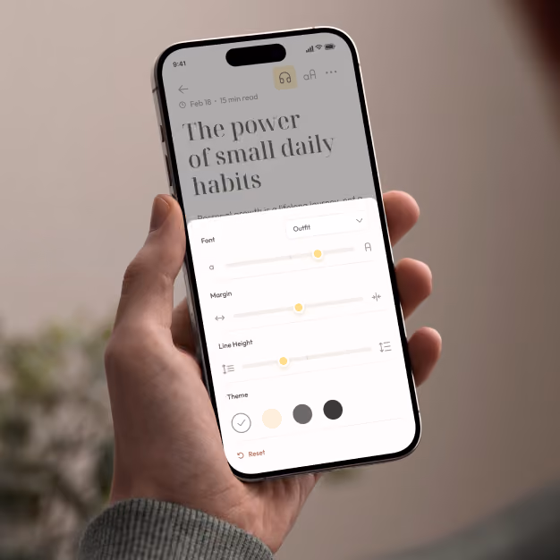 Omnivore mobile reading controls displayed on a phone held in a hand