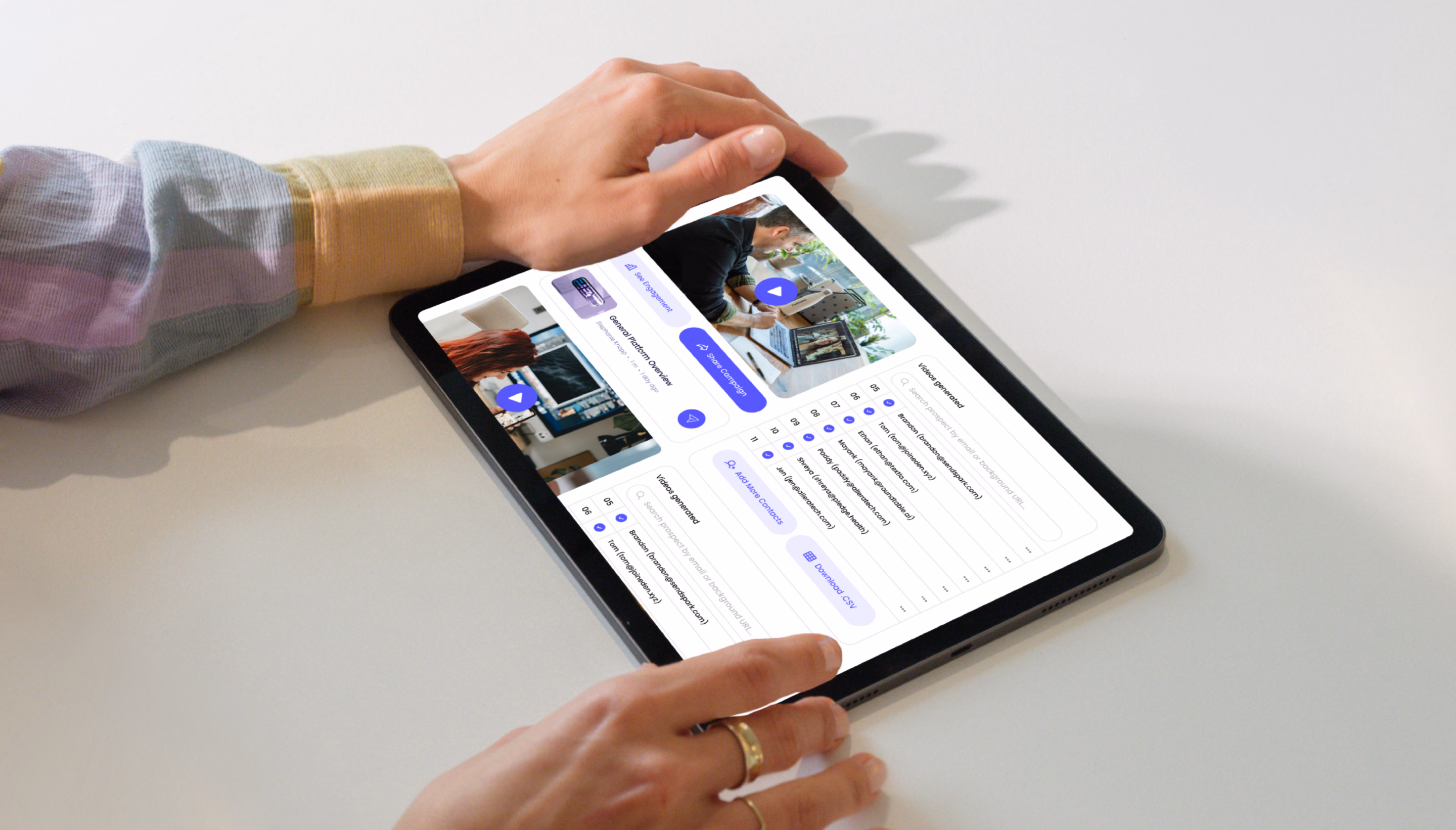 Sendspark personalized video dashboard displayed on a handheld tablet.