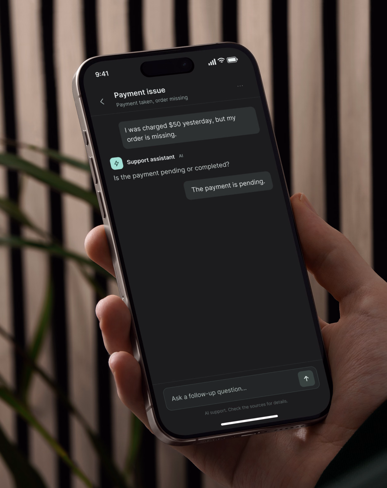 A customer using the support assistant on a phone.