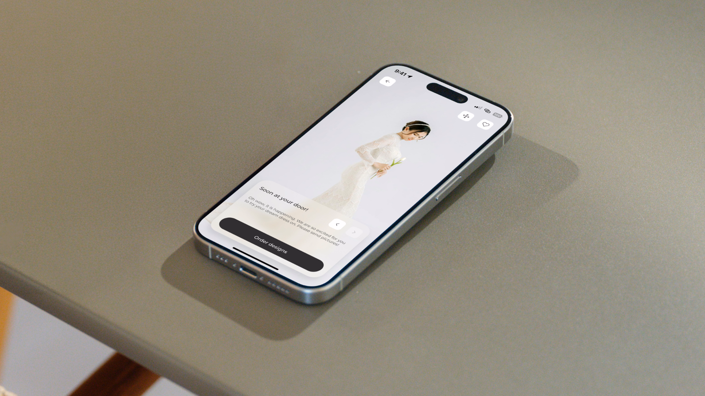 Anomalie dress builder on a laptop with wedding dress configuration options