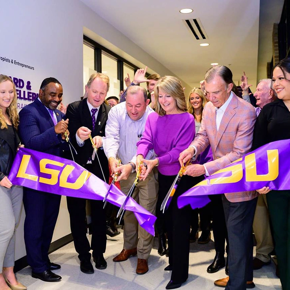 Group participating in an LSU ribbon-cutting ceremony.