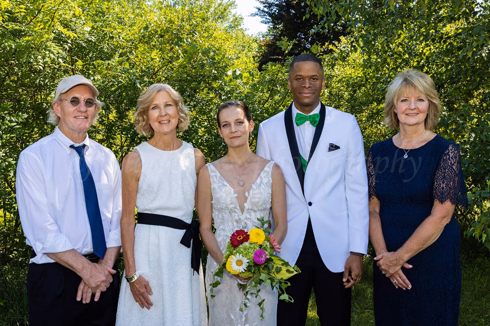 Wedding group photo at Michigan Arboretum and Botanical Gardens, Ann Arbor, MI by Fullerton Photography.