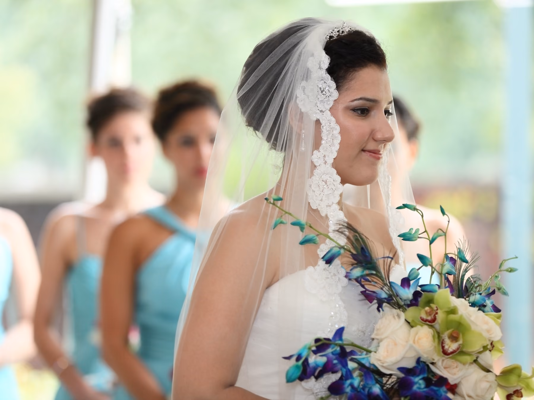 Bride portrait with bouquet by Fullerton Photography