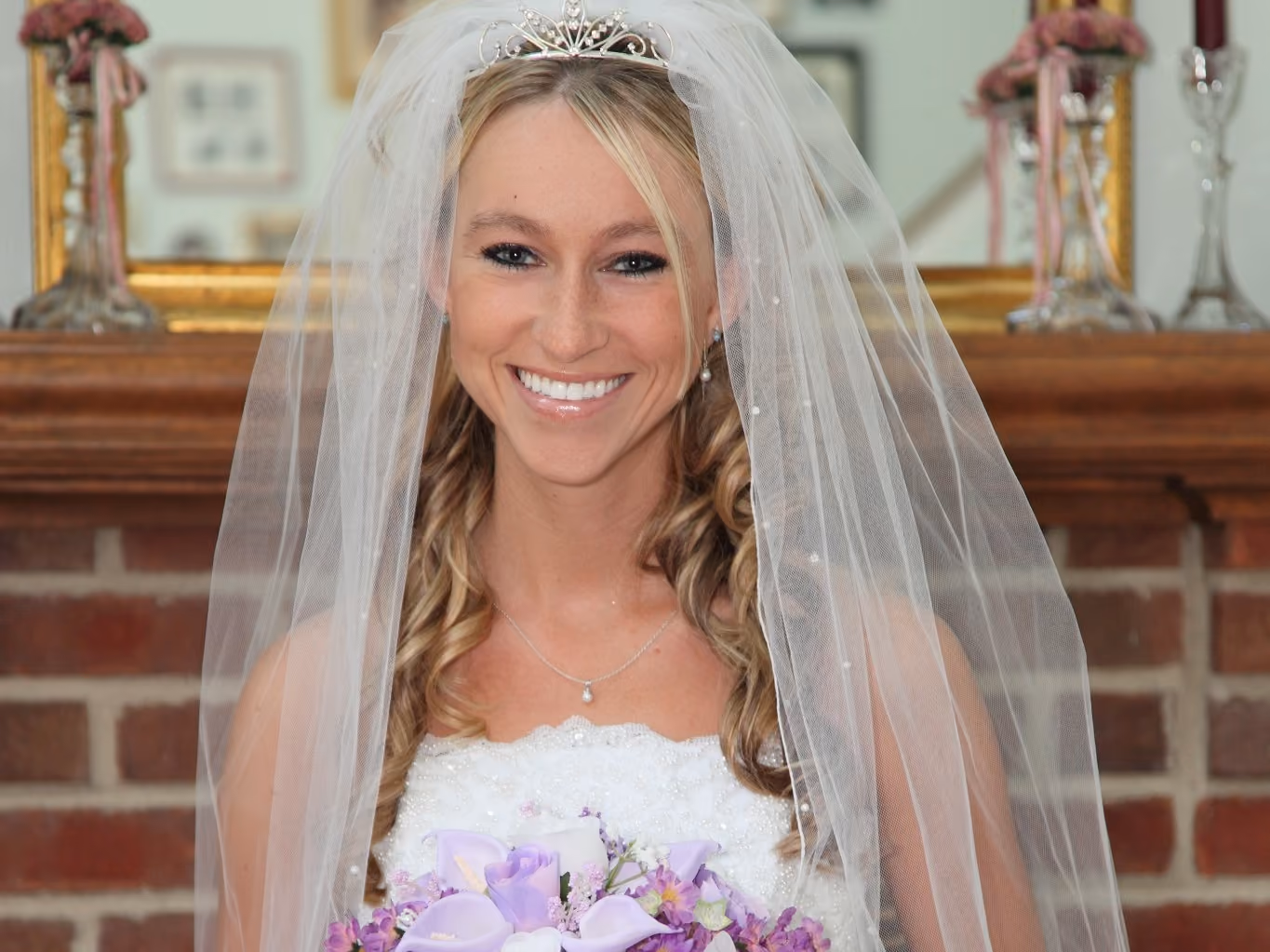 Bride portrait with purple bouquet by Fullerton Photography