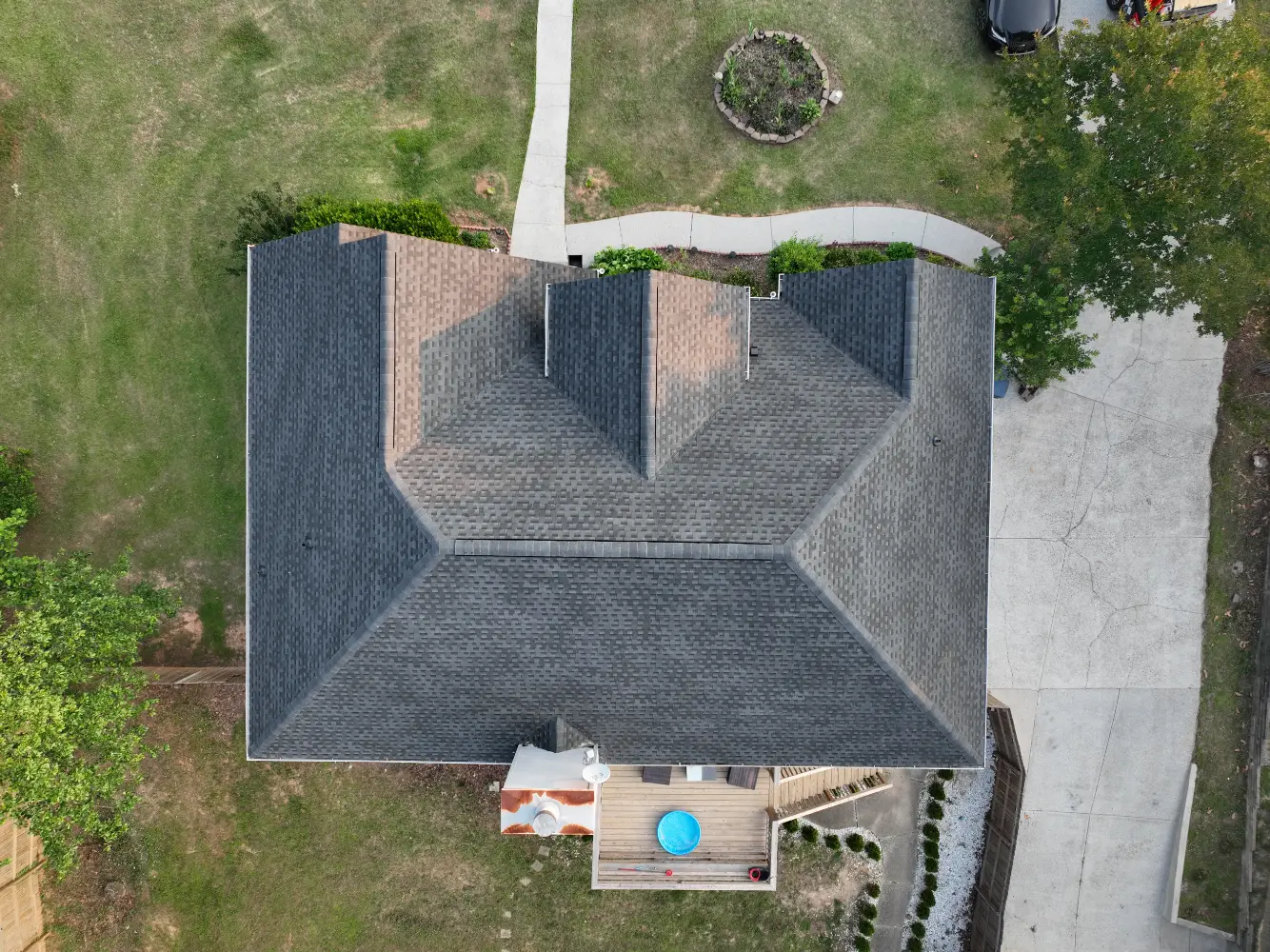 A completed residential roof replacement in Buford, Georgia, by Douglas Construction, a trusted residential roofing contractor. The home features a durable, high-quality roof with expertly installed shingles.