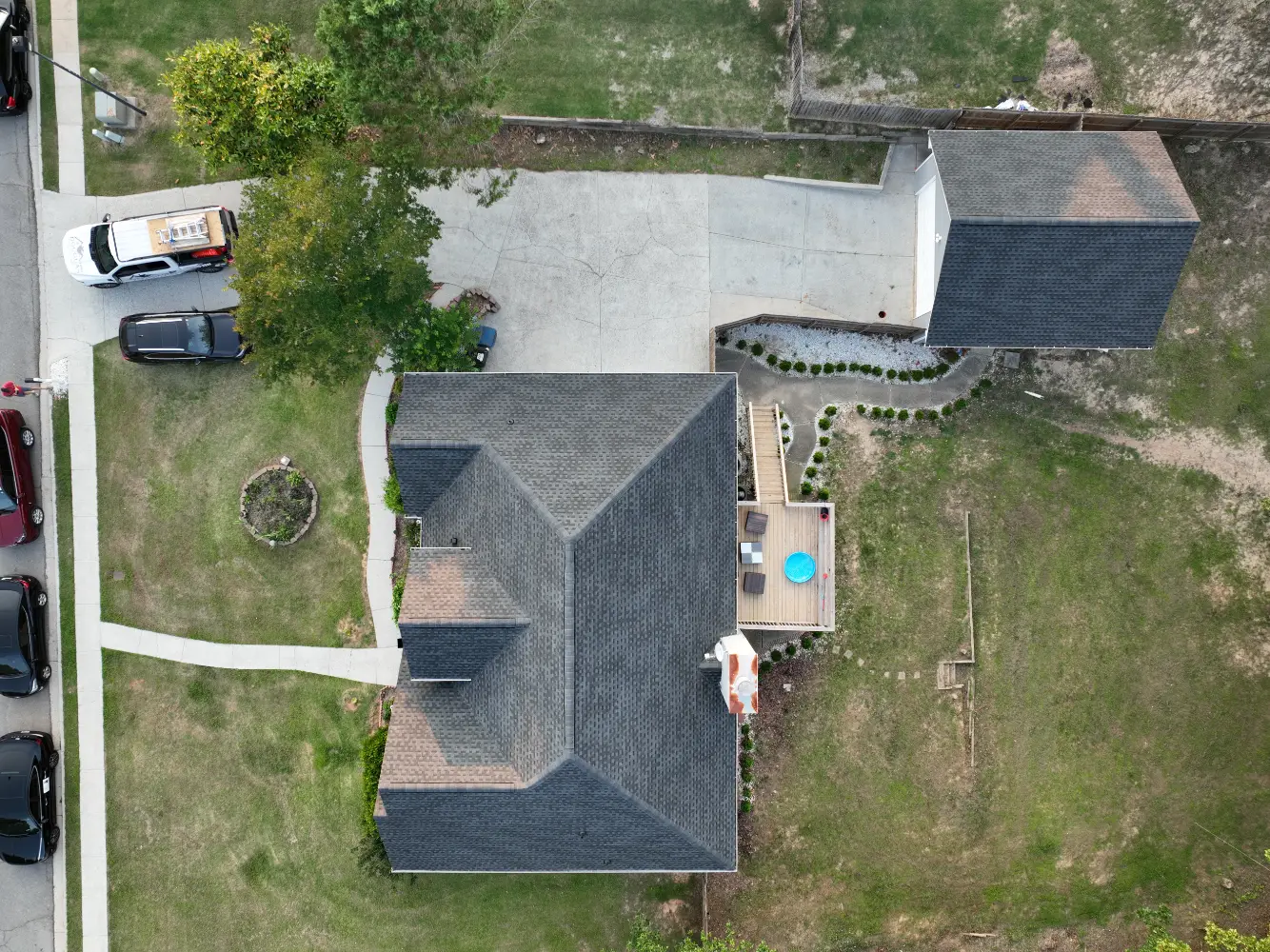 A completed residential roof replacement in Buford, Georgia, by Douglas Construction, a trusted residential roofing contractor. The home features a durable, high-quality roof with expertly installed shingles.
