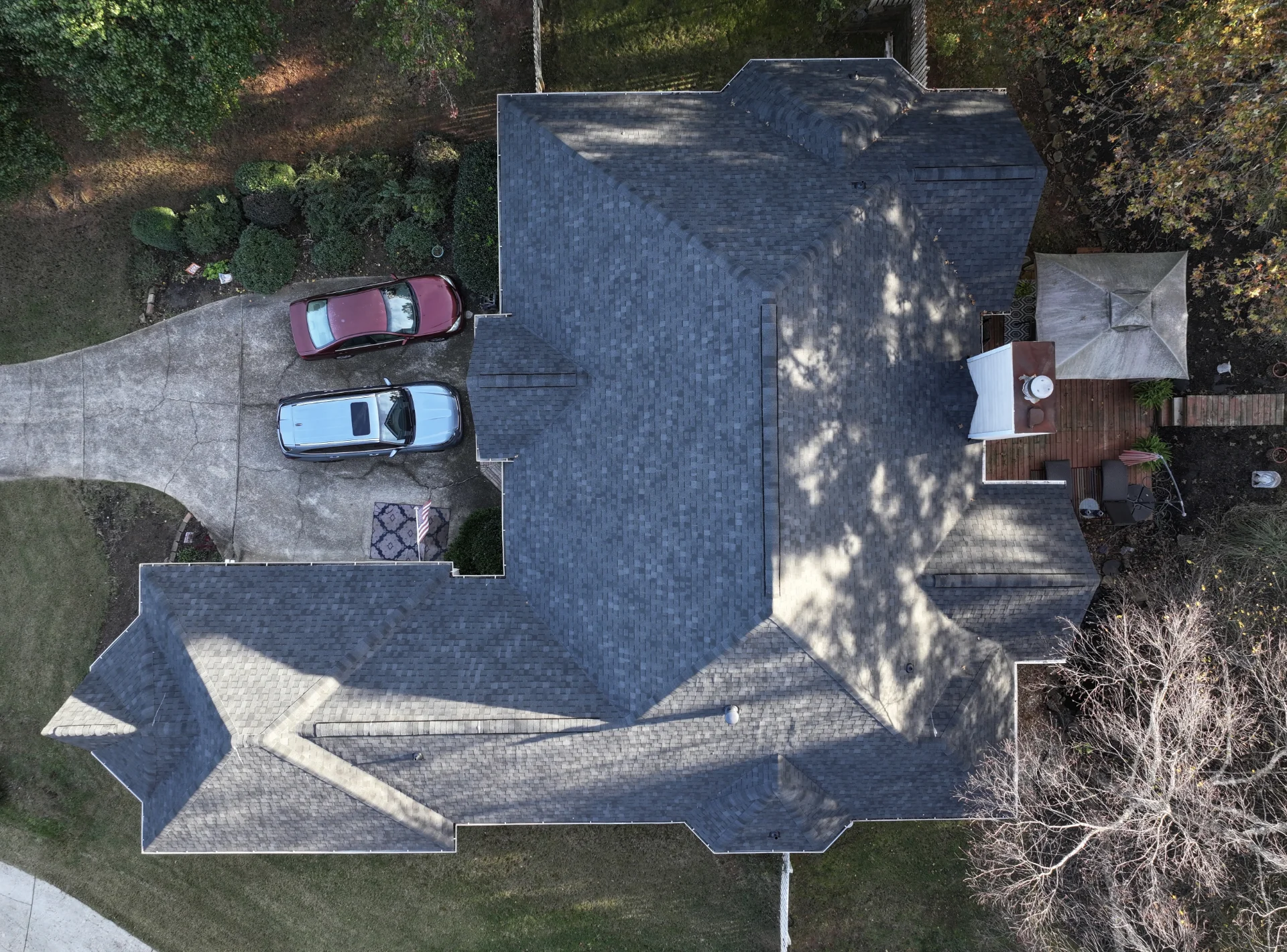 A newly completed residential roof replacement in Lawrenceville, Georgia, by Douglas Construction, a trusted residential roofing contractor. The home features a durable, high-quality roof with expertly installed shingles.
