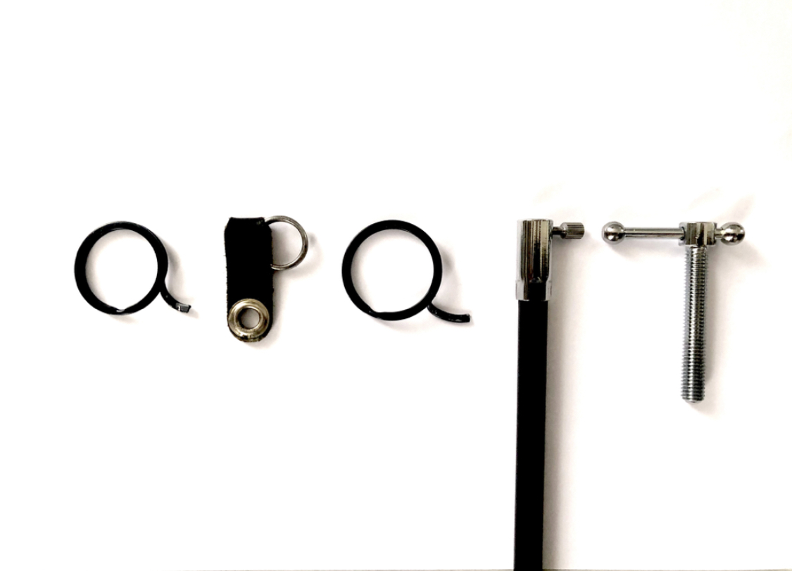 APART spelled out using an arrangement of metal objects.