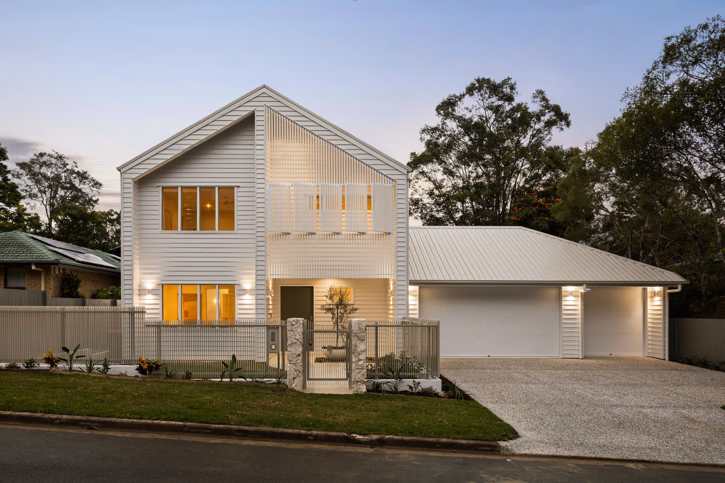 Completed Kingdom Constructions home in Tarragindi at dusk