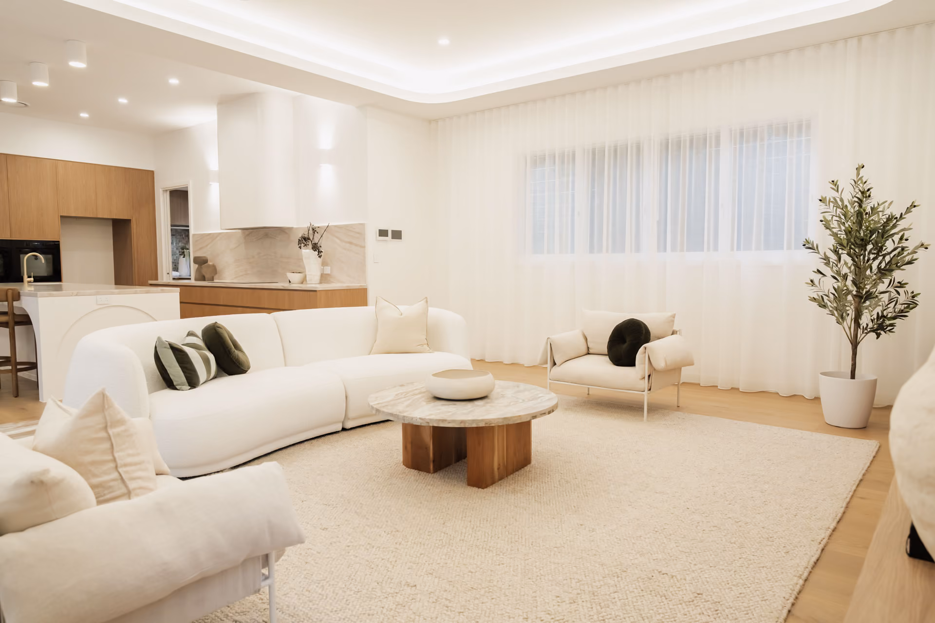 Open-plan living and kitchen in a completed Kingdom Constructions home