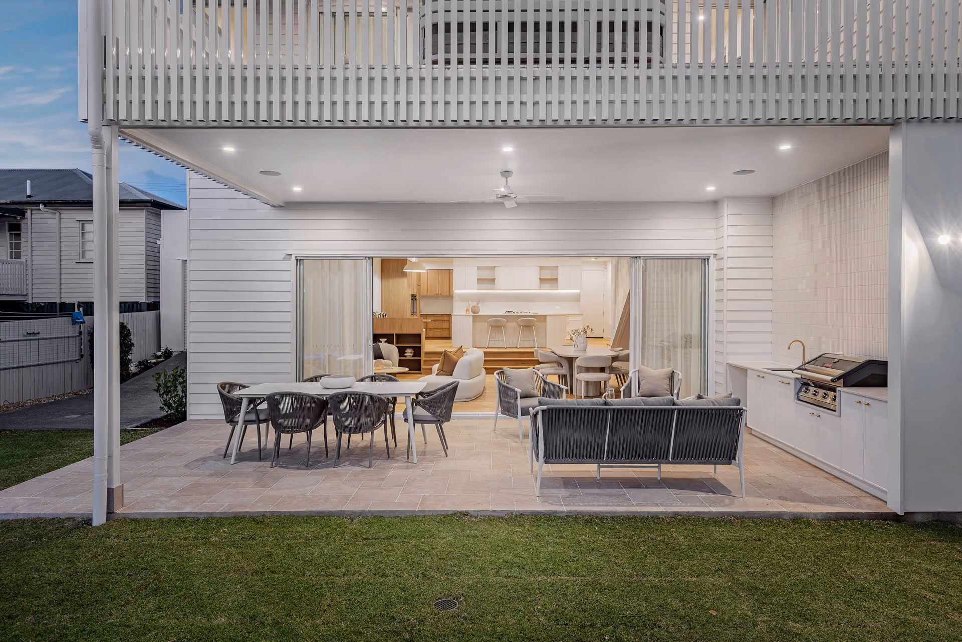 Covered outdoor living and dining in a completed Kingdom Constructions home