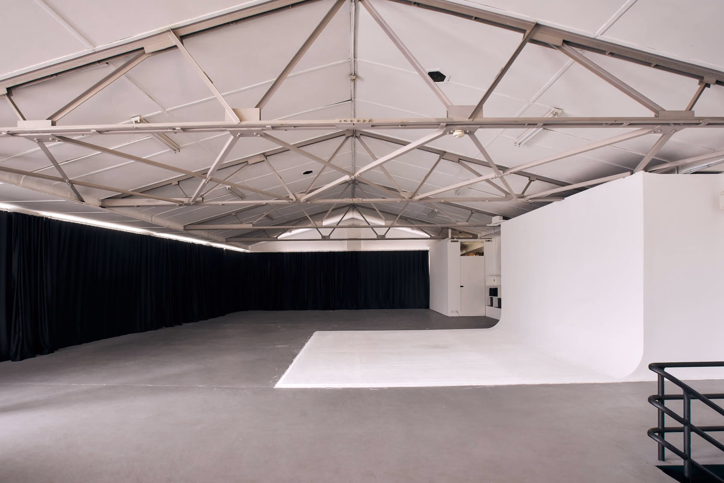 Looking across the cyclorama of Frank the studio with the floor to ceiling curtains pulled shut