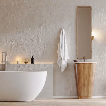 A renovated bathroom with a freestanding bath