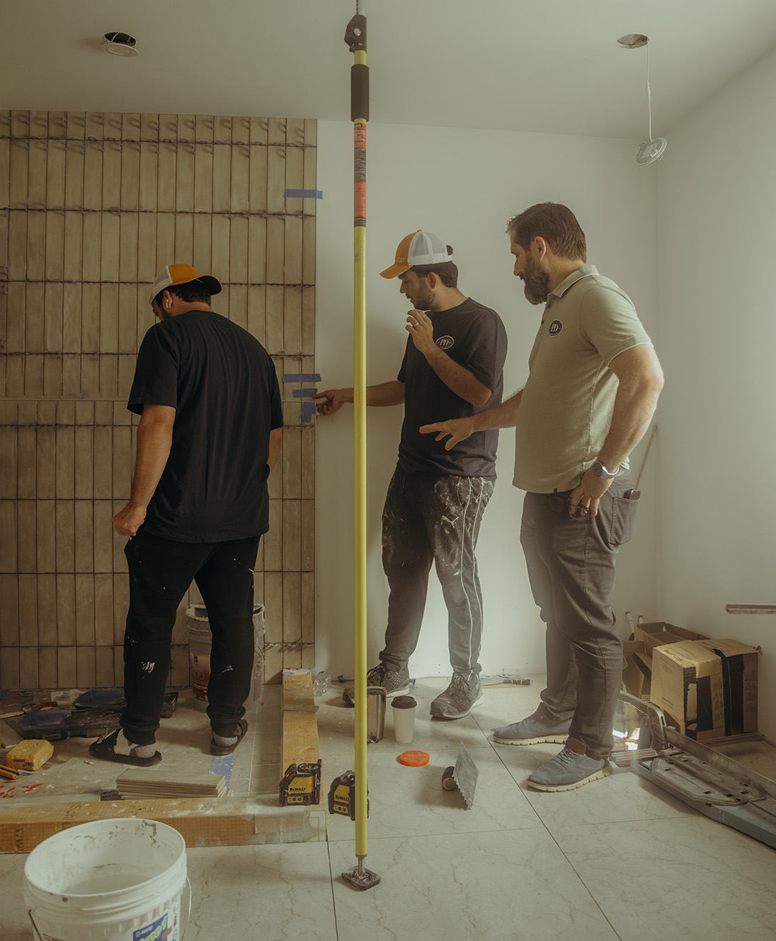 PD Renovations working on a construction site