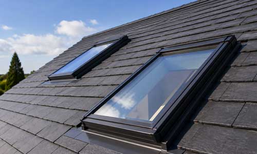 Velux installation and replacement, skylight fitting, flashing kits and repairs around roof windows.