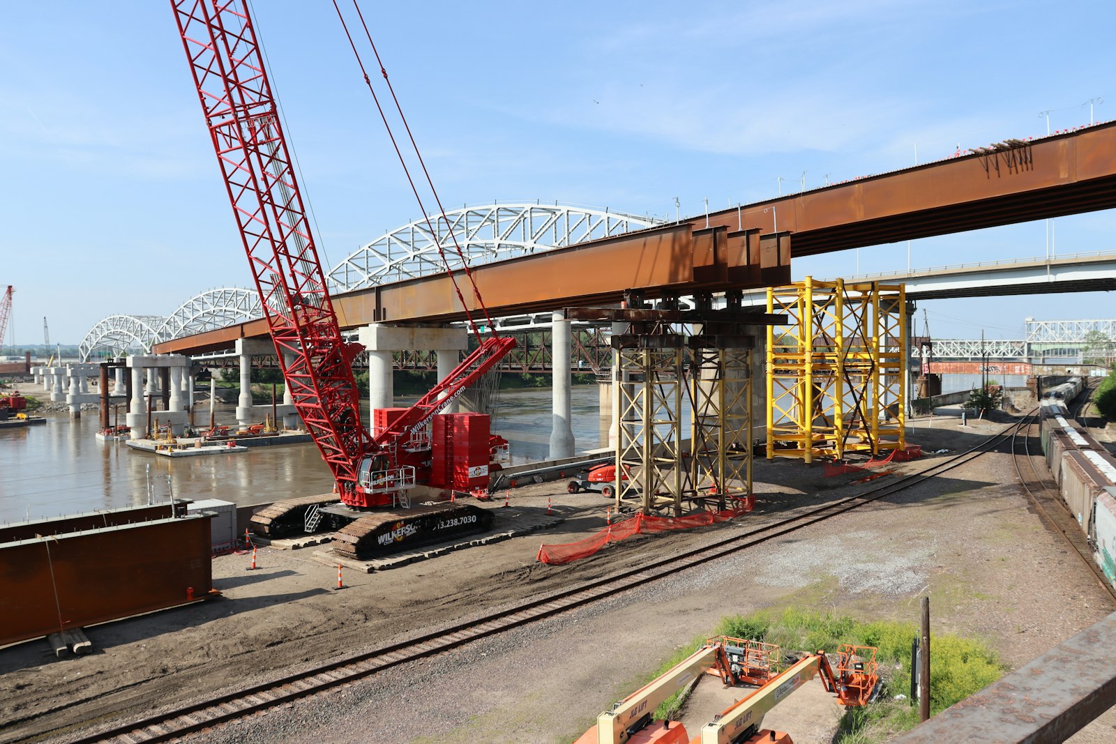 Crane working alongside a rail line | Westside Construction Group