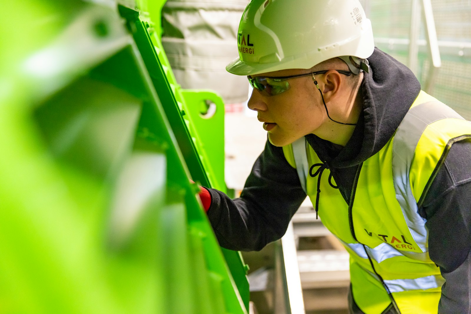 Worker in hard hat and safety gear | Westside Construction Group