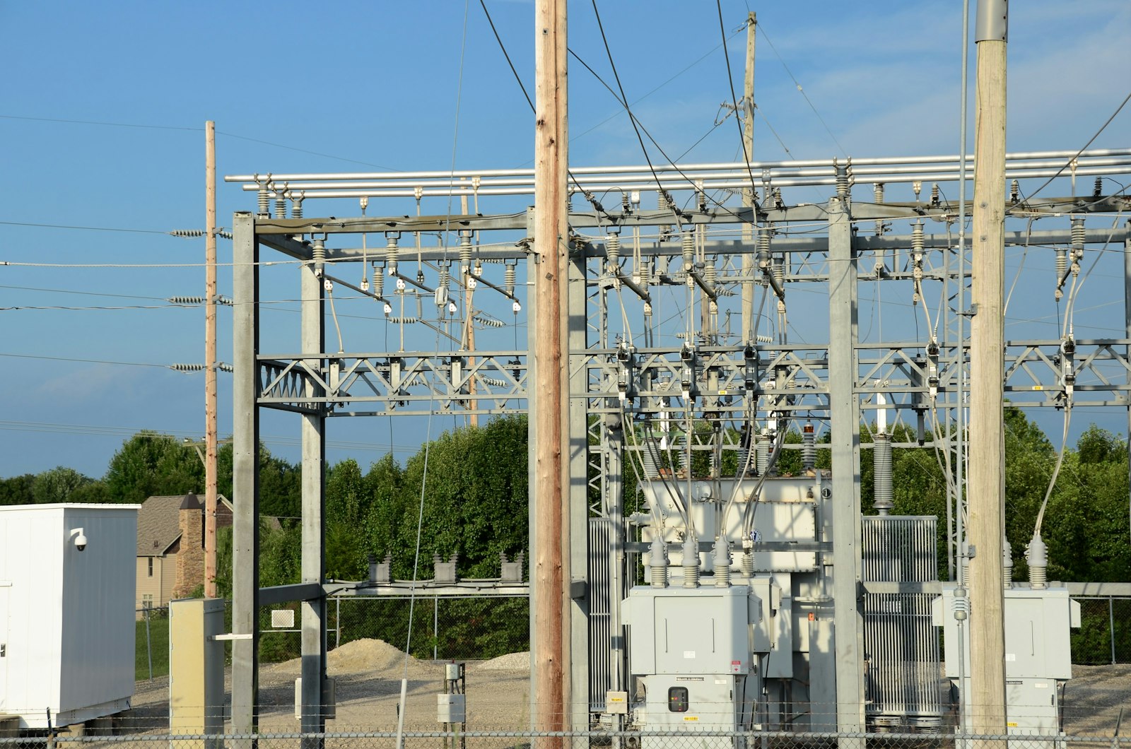 Electrical substation with transformers and high-voltage lines | Westside Construction Group