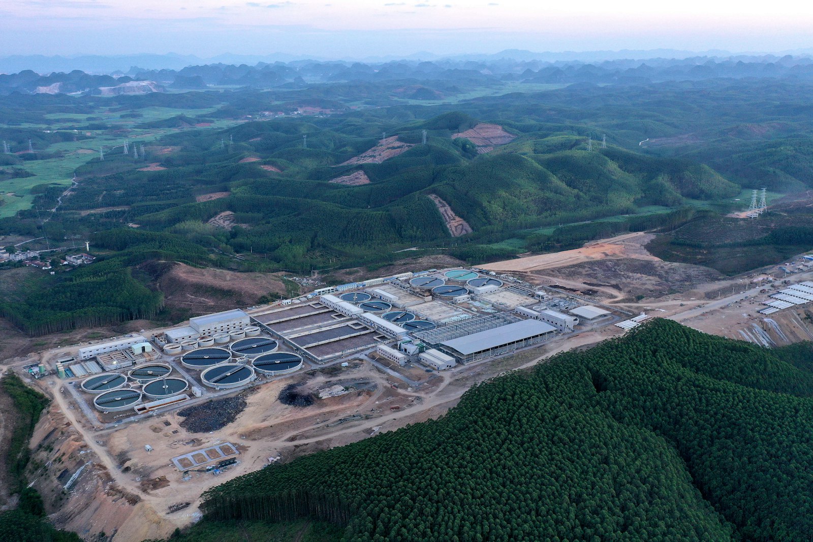 Industrial manufacturing facility set among hills | Westside Construction Group