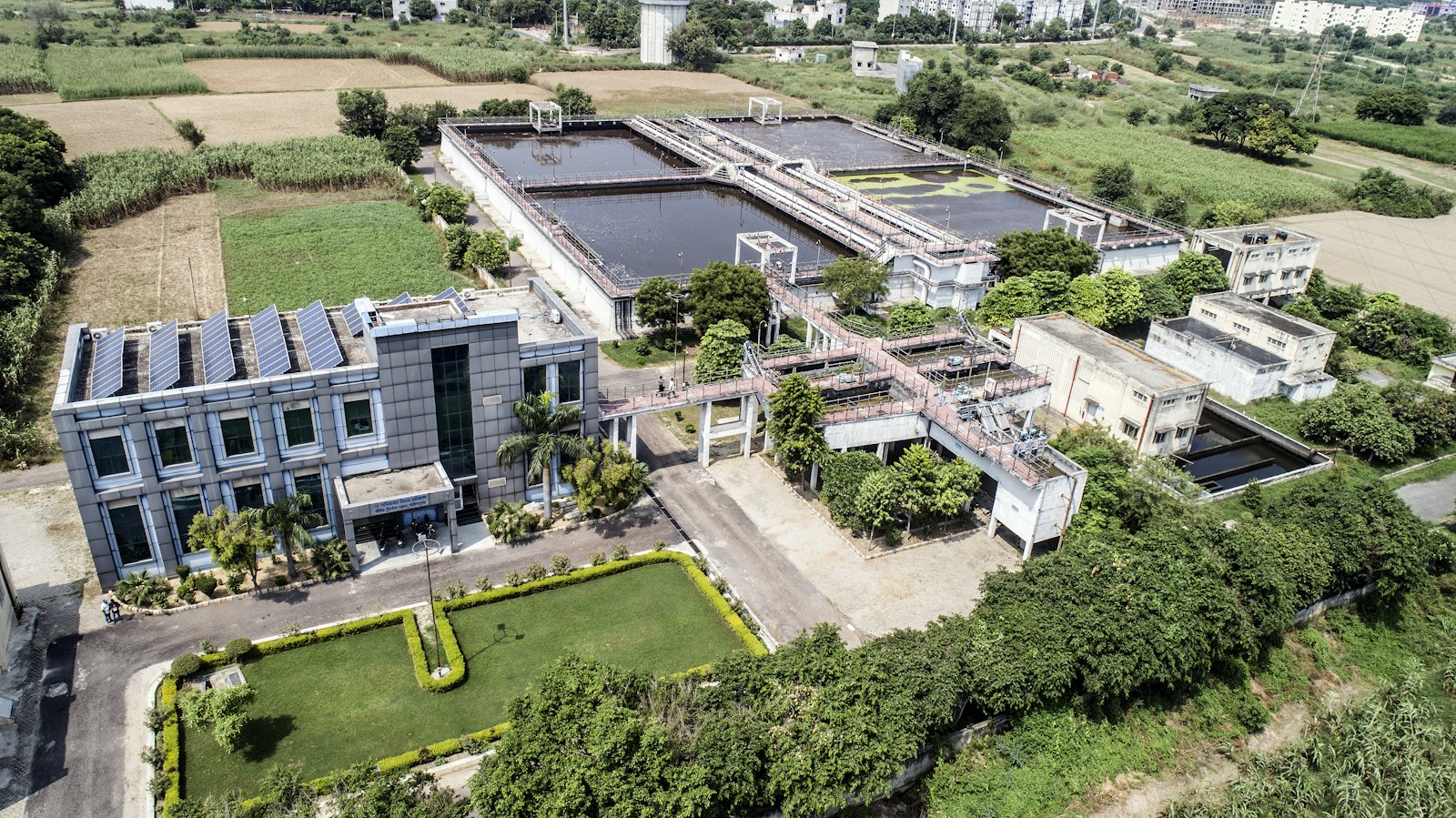 Aerial view of a water treatment plant surrounded by fields | Westside Construction Group