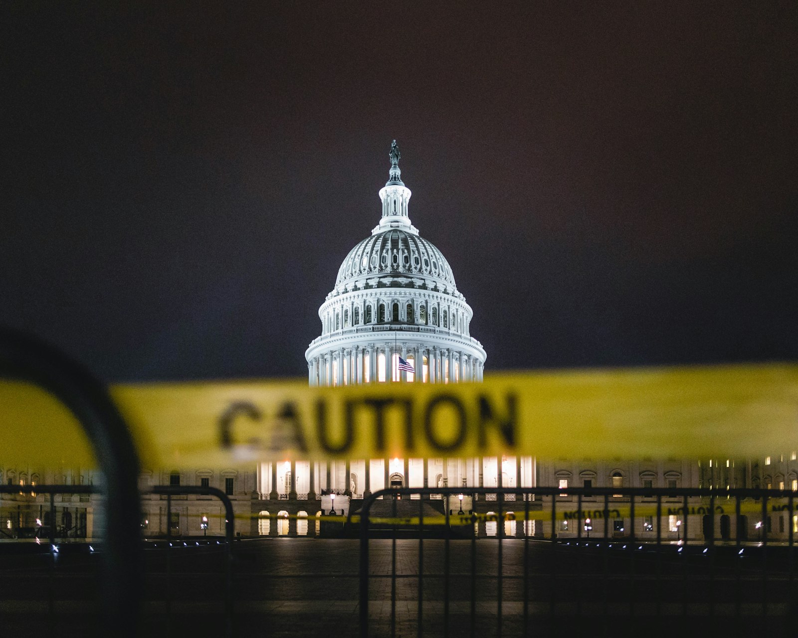 Government building lit at night | Westside Construction Group