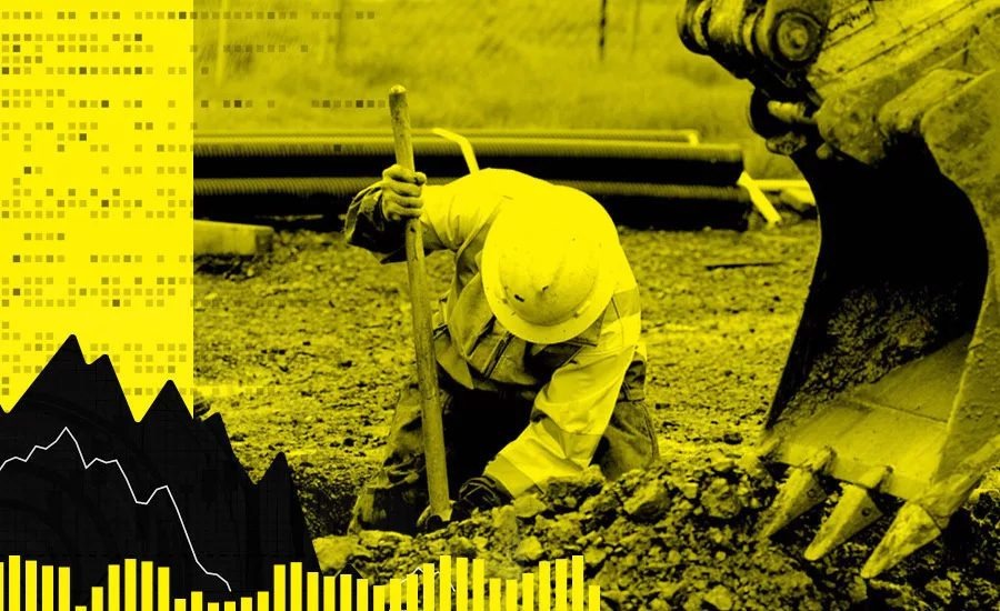 Construction worker digging beside an excavator bucket, ENR jobs report illustration