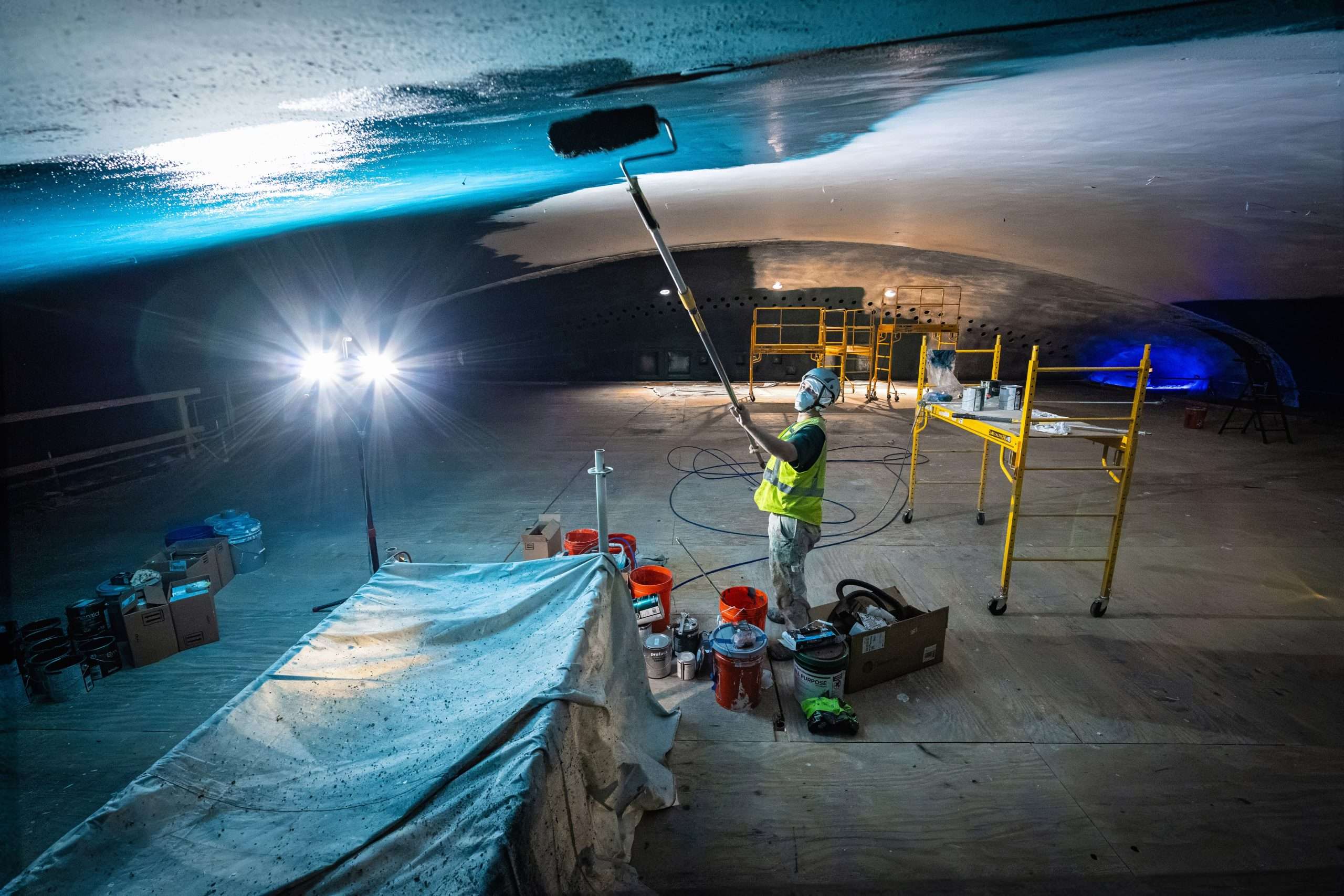 Restoration crew painting the night sky ceiling of the Duncan Auditorium at Tampa Theatre | Westside Construction Group