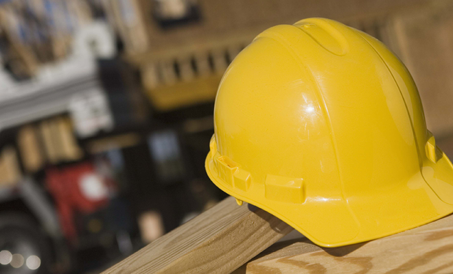Yellow construction hard hat used to illustrate New York's County Infrastructure Grant Program | Westside Construction Group