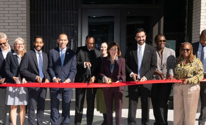 Governor Hochul and elected officials cutting the ribbon at Innovative Urban Village in East New York | Westside Construction Group