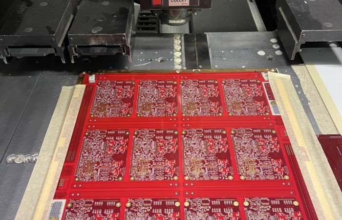 Printed circuit board panels being drilled at Gorilla Circuits