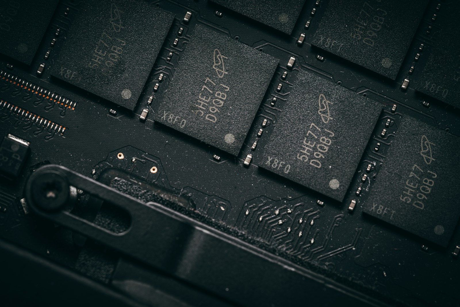 Illustrative close-up of surface-mount integrated circuits on a circuit board, not the discontinued Littelfuse devices