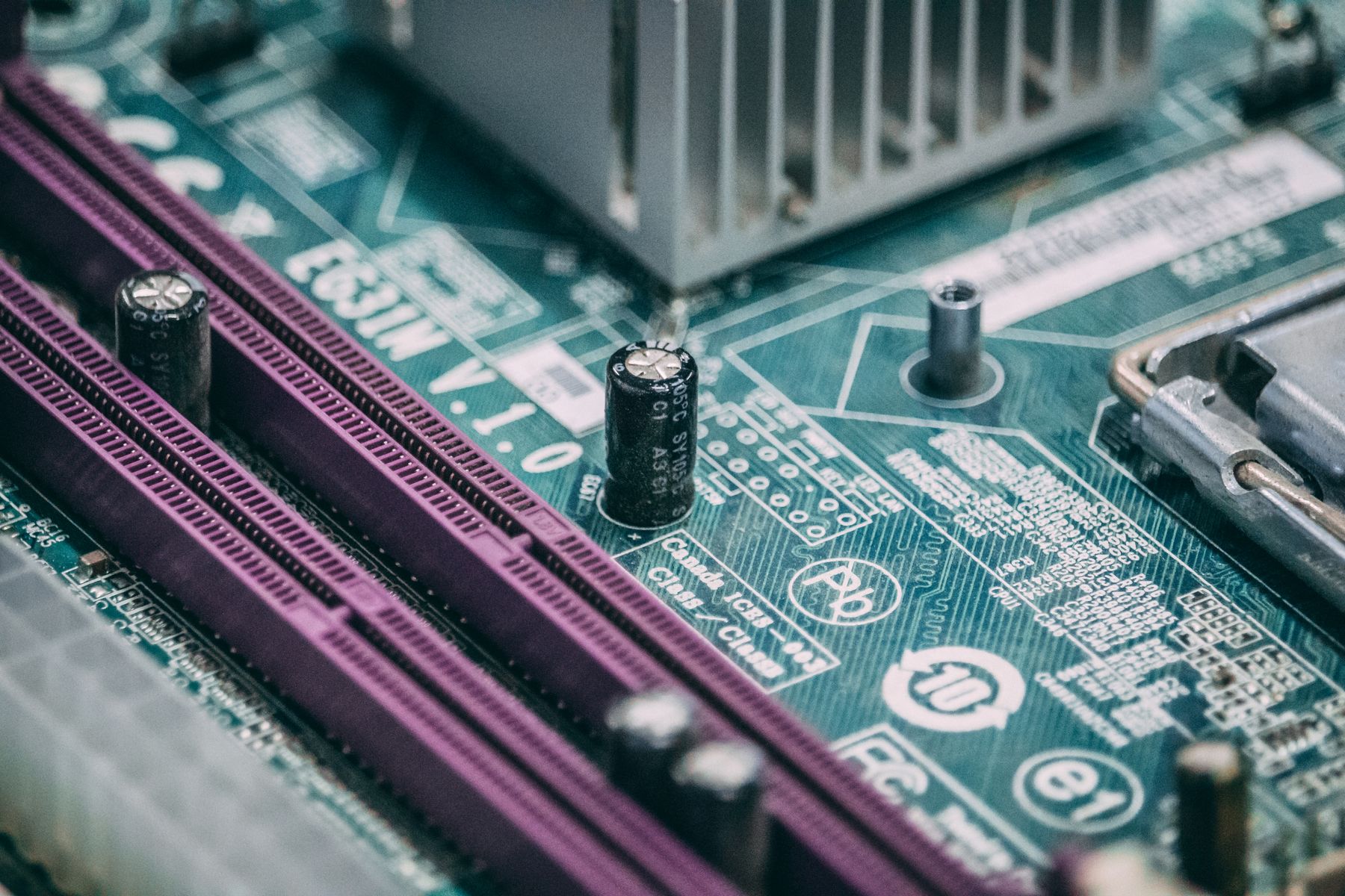 Illustrative circuit-board photograph; not the TI reference design or a supercapacitor identification