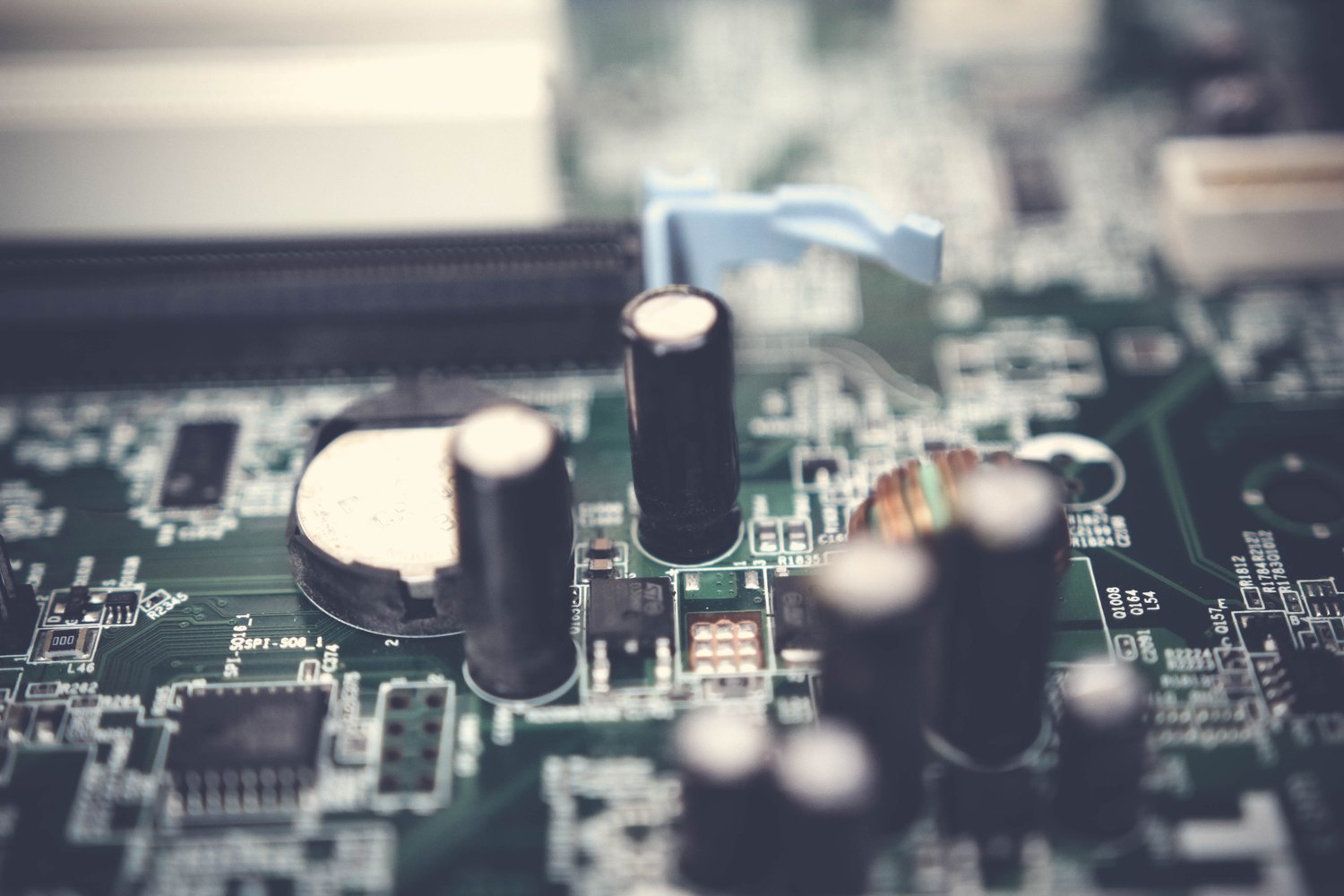 Electrolytic capacitors and other components fitted to a circuit board