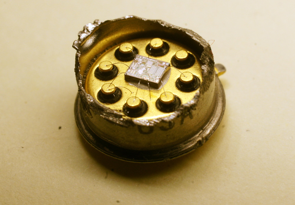 Opened OPA627 operational amplifier package.