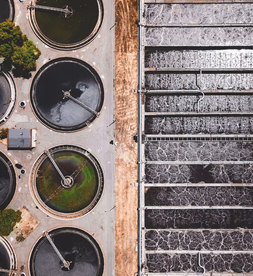 Aerial view of circular tanks at a water treatment plant