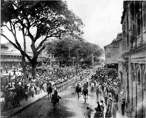 Procession through a Port of Spain street at the turn of the twentieth century