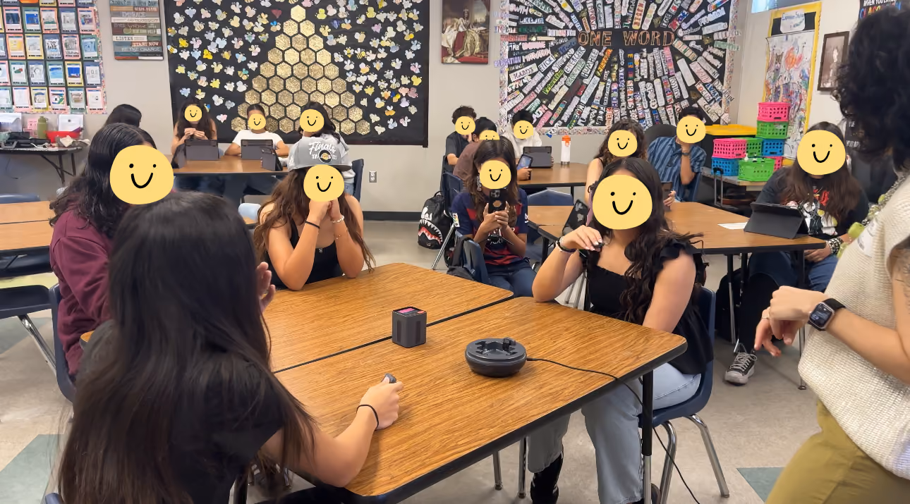 Pam Covarrubias recording with students at middle school career day