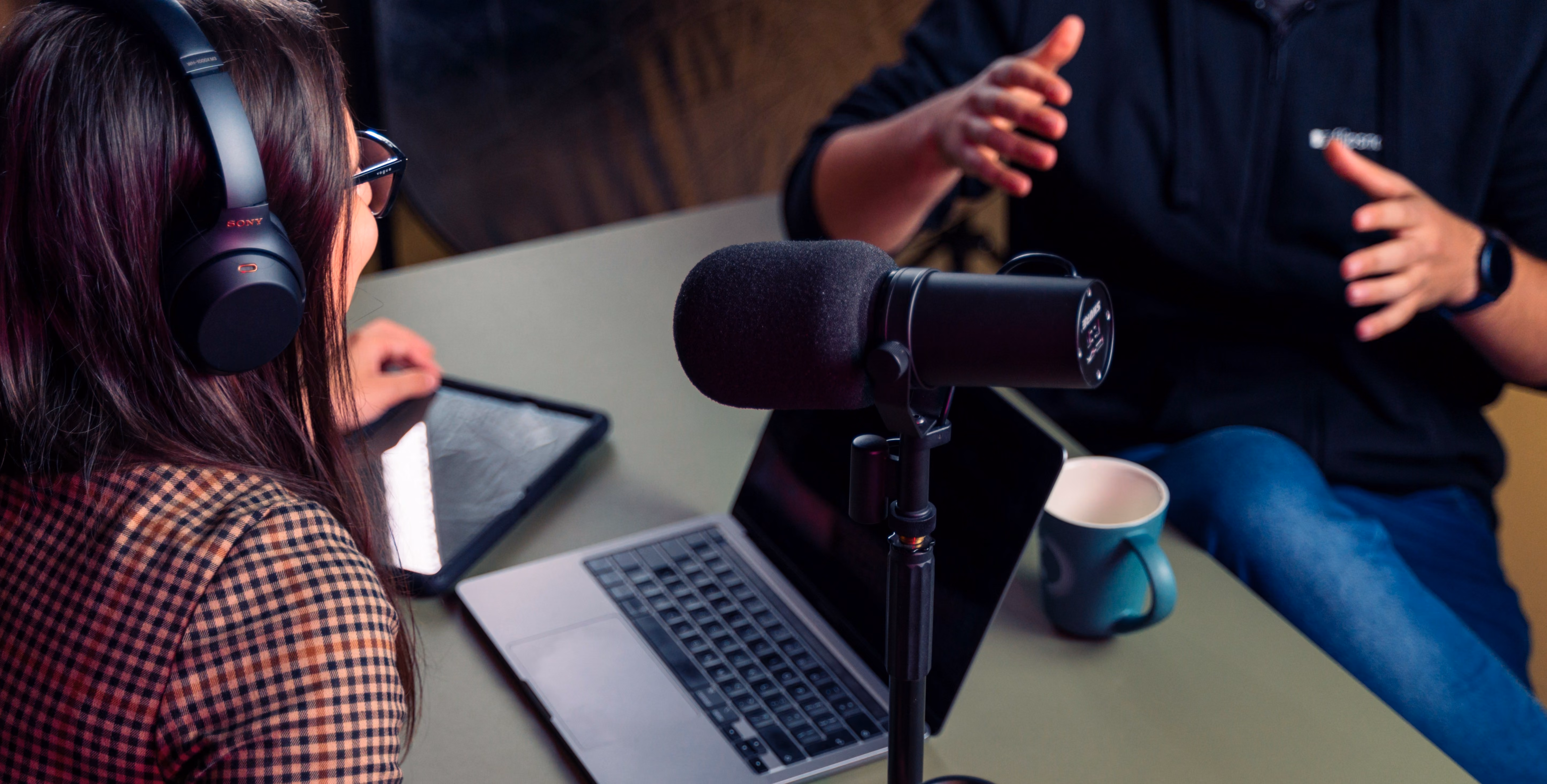 Podcasting for education — person using headphones and laptop