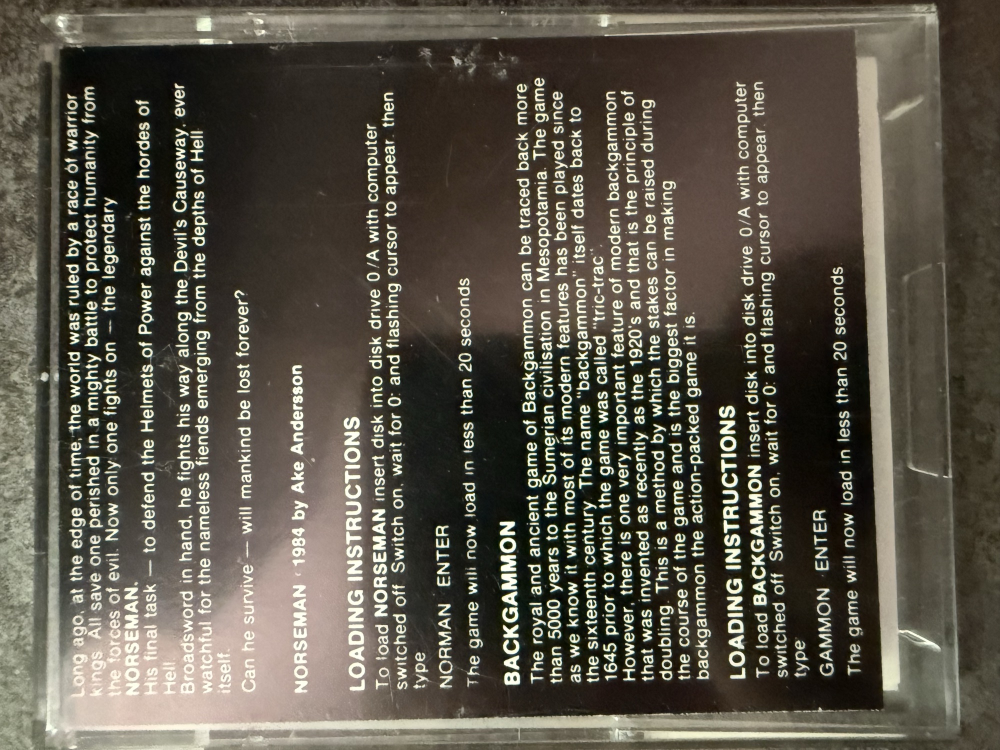 Back of the case with the Norseman story, the credit Norseman 1984 by Ake Andersson, and loading instructions for both games