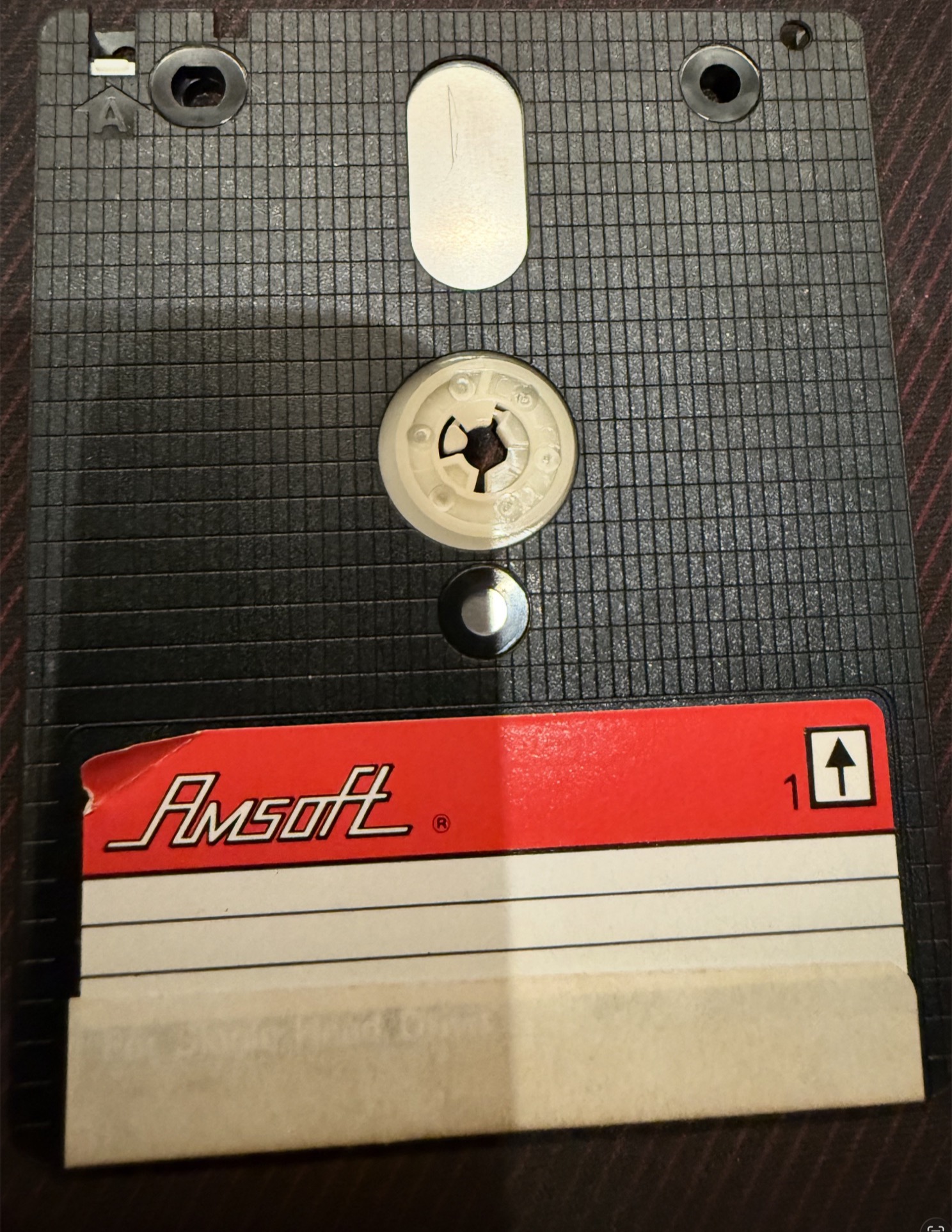 Side A of the disc: an unwritten Amsoft CF2 label; this side is formatted but blank
