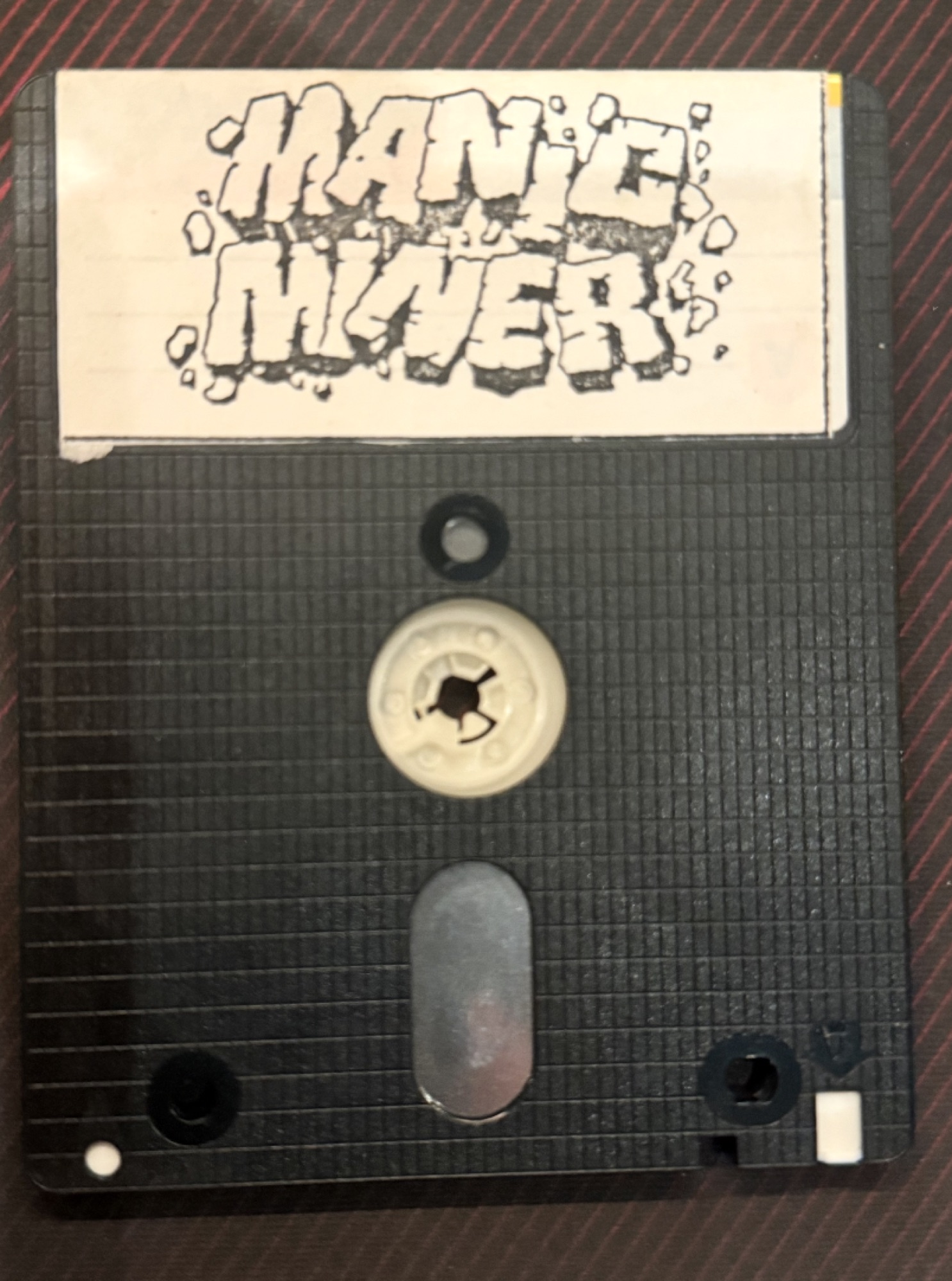 Side A of the 3 inch disc with its Manic Miner label