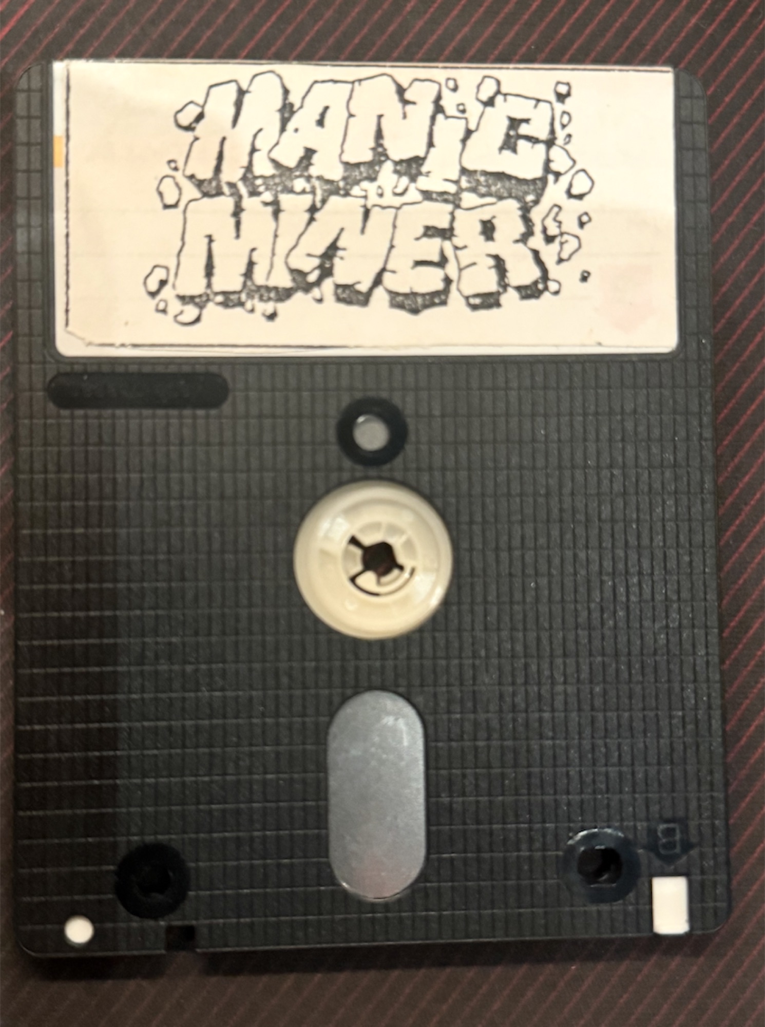 Side B of the 3 inch disc, carrying the same Manic Miner label as side A