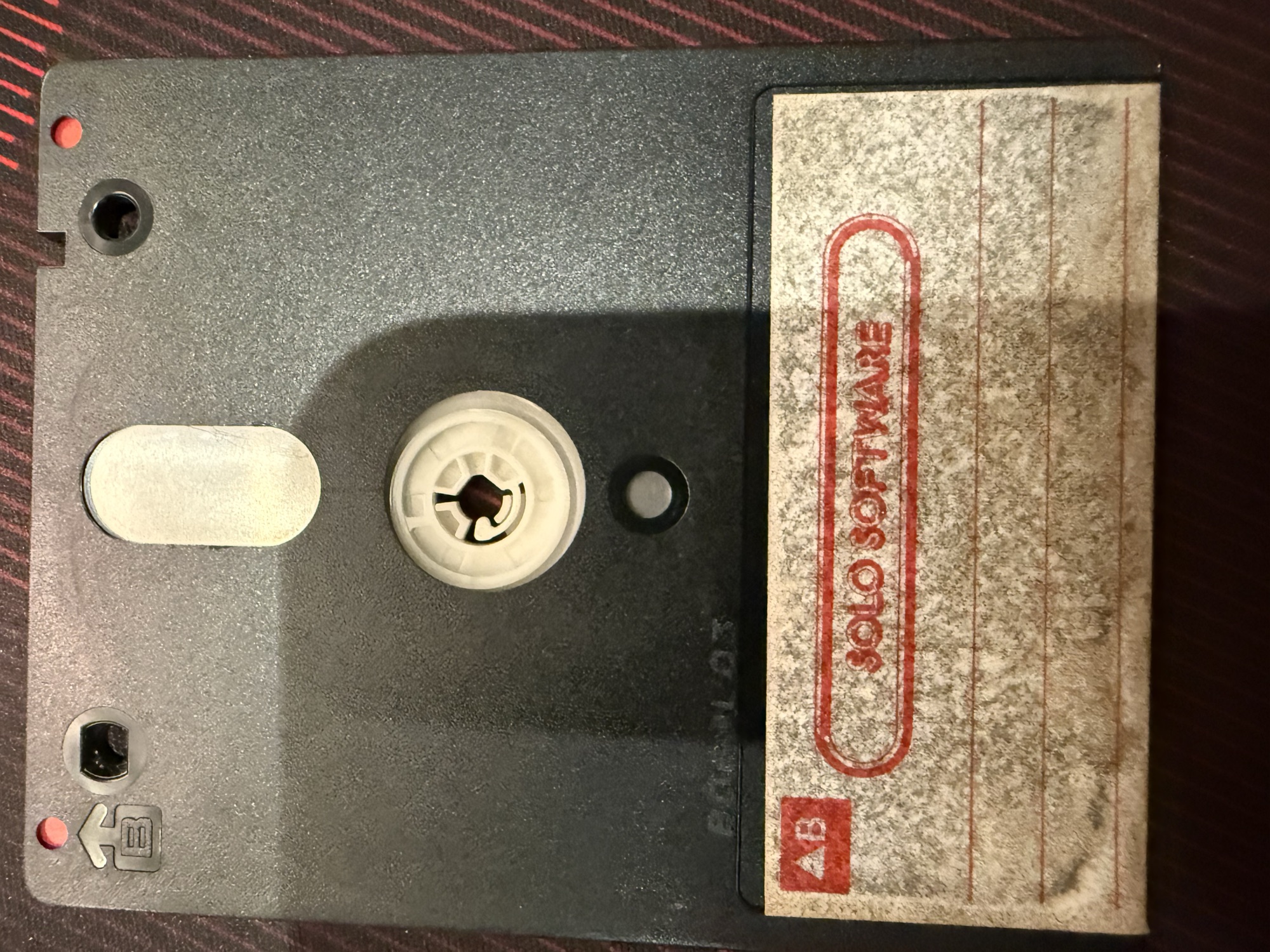 Side B of the disc, with a blank Solo Software label