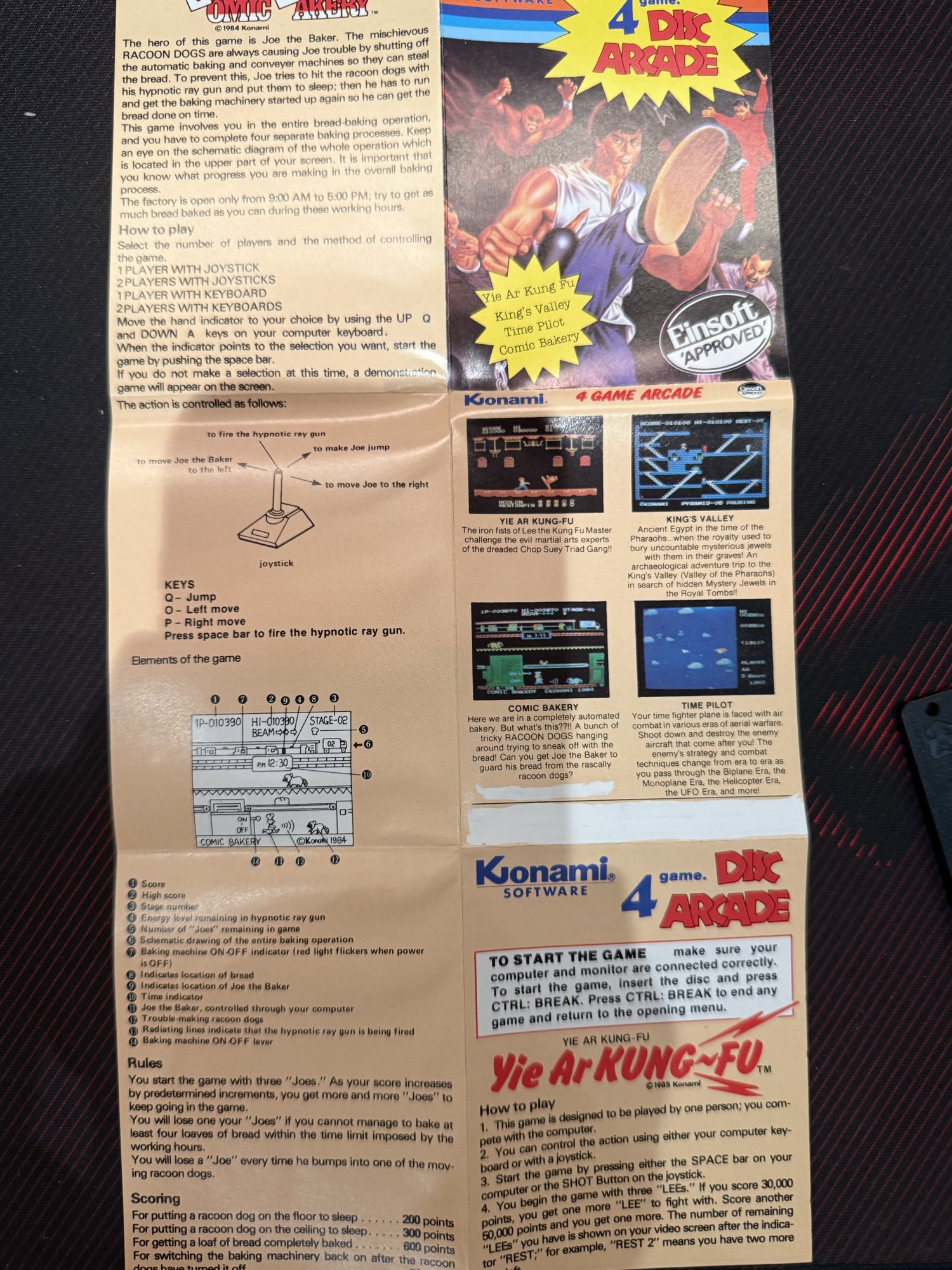 The fold-out inlay: 4 Disc Arcade artwork, Einsoft Approved, and Yie Ar Kung Fu's instructions