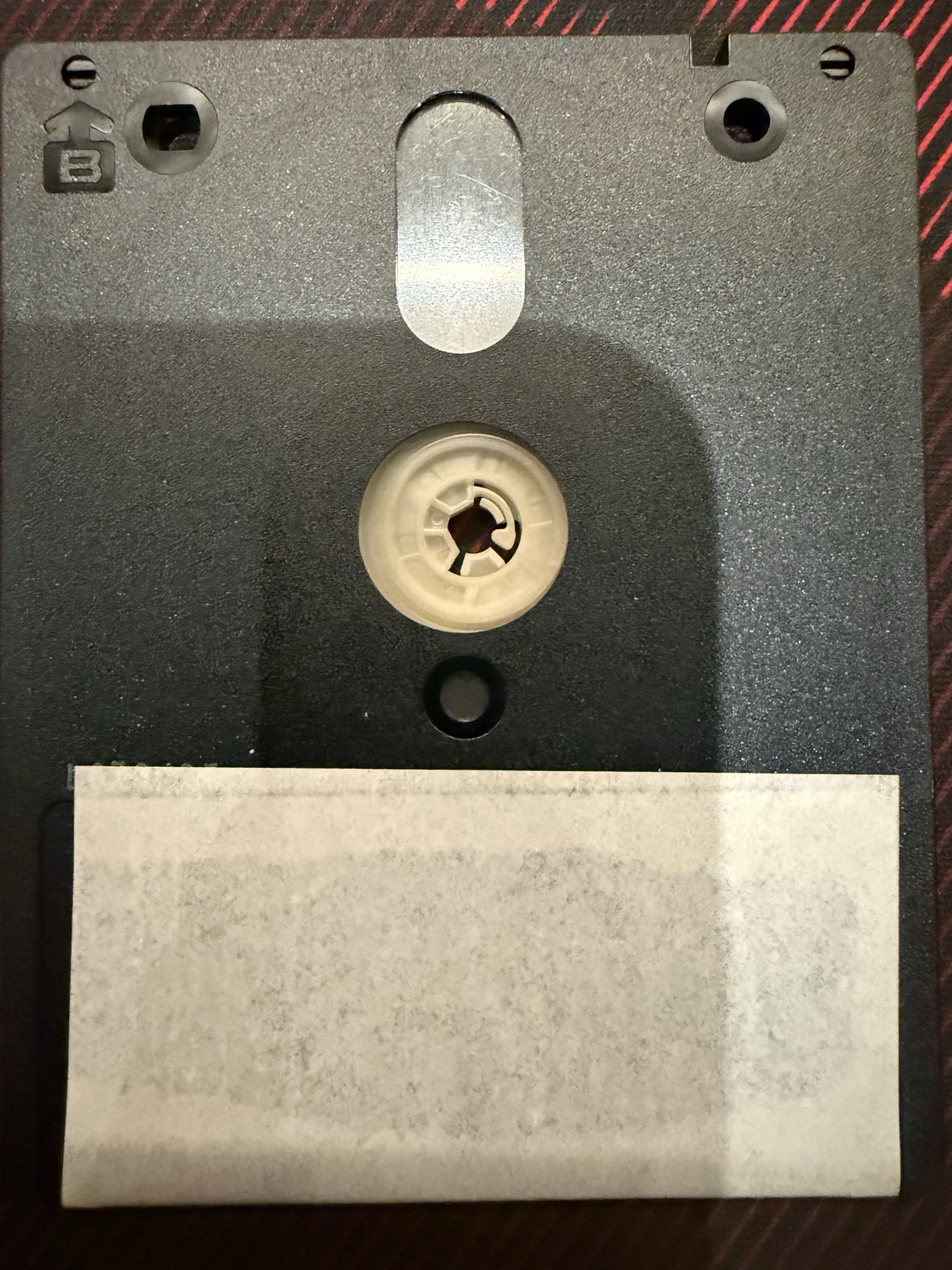 Side B of the disc, with a blank label