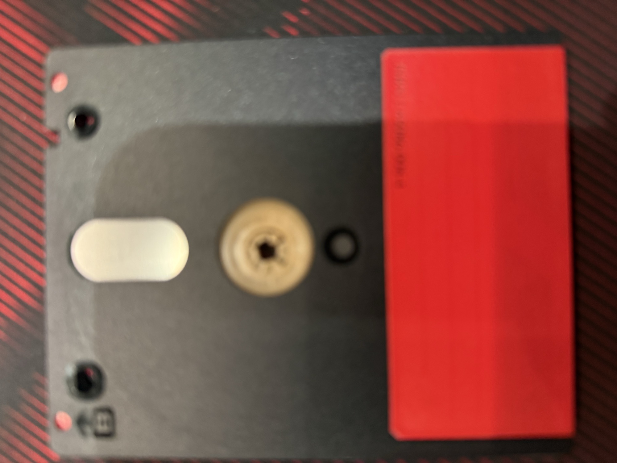 The Disco Dan disc, side B, with a plain red label