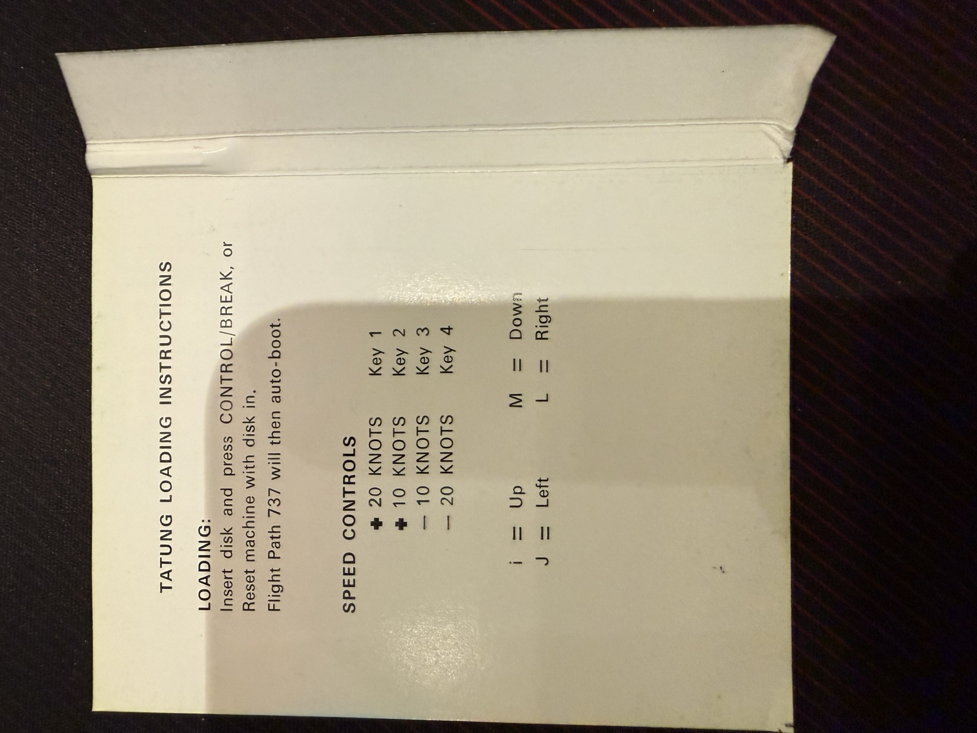 Tatung loading instructions card with the speed and direction keys