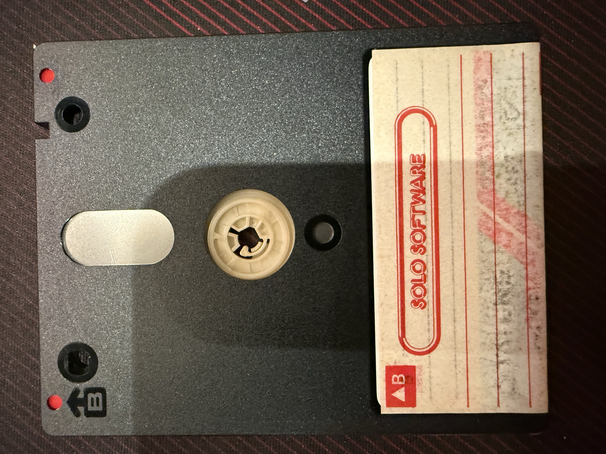 The disc, side B, with a blank Solo Software label
