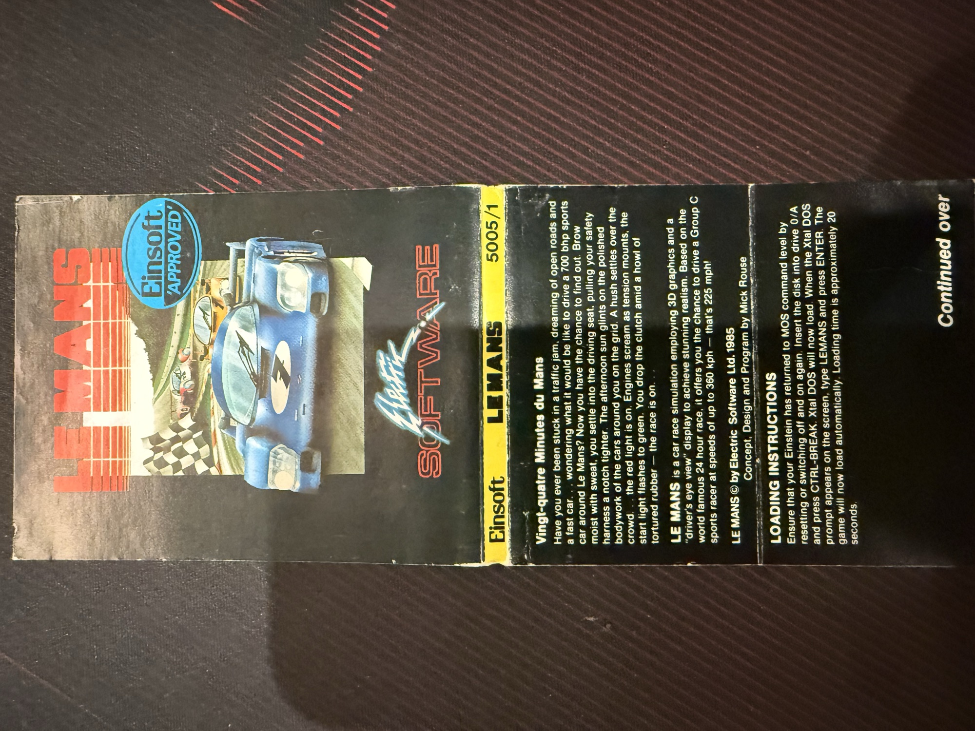 The inlay opened out, with the description and loading instructions